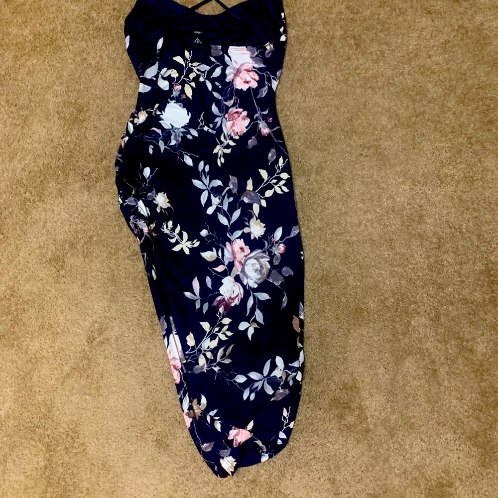 Flower print summer dress with slit to show a little leg action.